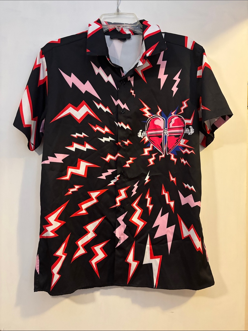 Black Graphic Short-Sleeve Shirt. Fits like a men’s medium. Size tag missing